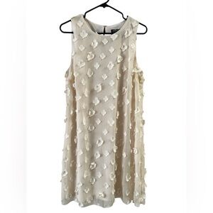 Prelude ivory floral mini dress with bow back detail